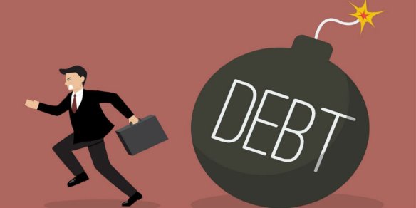 bigstock-Businessman-Run-Away-From-Debt-103353212