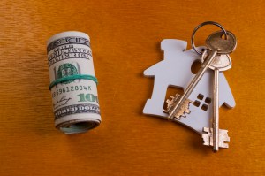 house key and dollars.Real estate concept